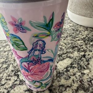 Lilly Pulitzer tumbler with mermaid in background